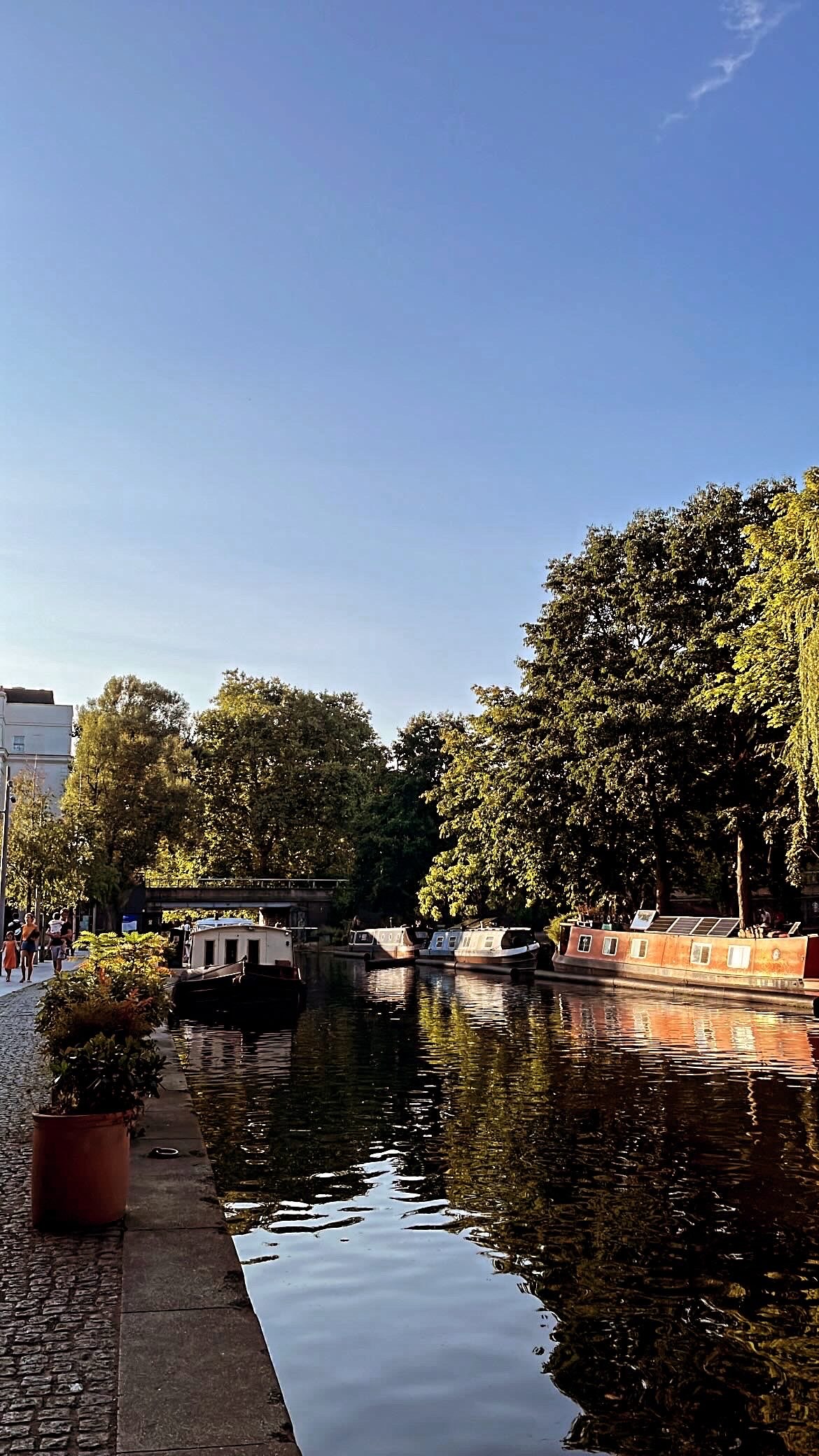 Boats floating on the peaceful canal in Little Venice, London.